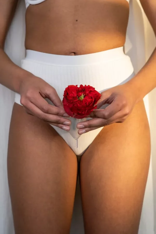 Woman With Cotton underwear and a rose